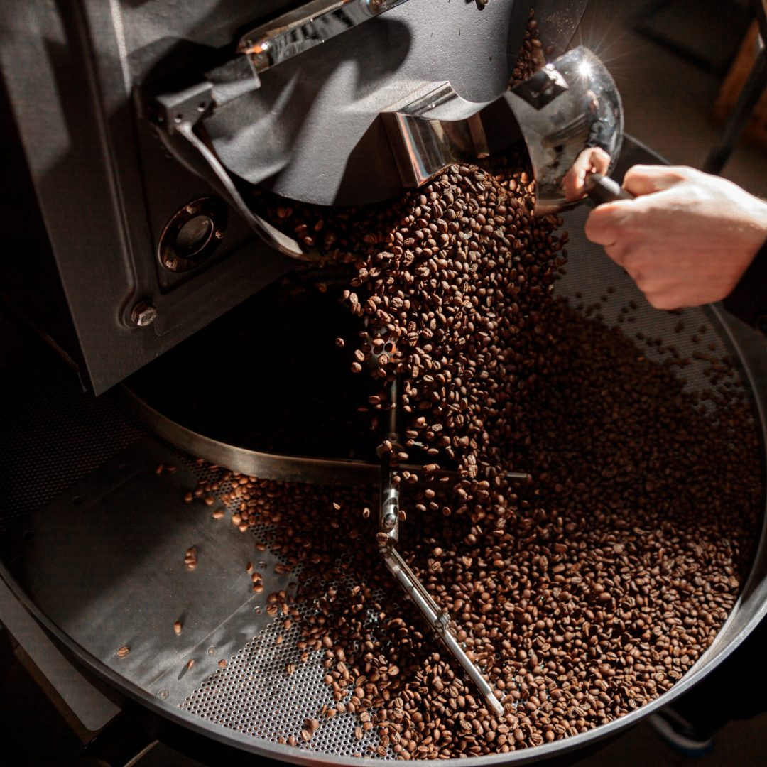 confident coffee roaster man is checking preparation process confident coffee roaster man is checking preparation process